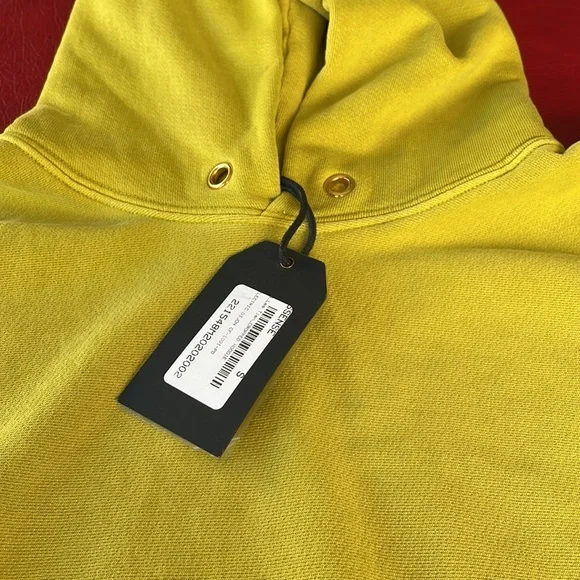 Unisex hoodie by Les Tien.